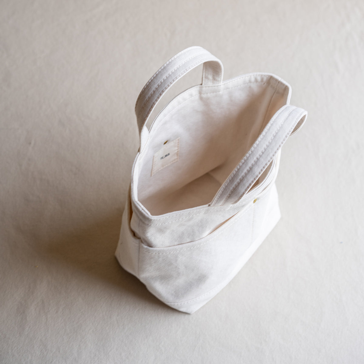 POCKET TOTE - ivory -